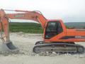 Экскаватор гусеничный Doosan Solar 225NLC-V, с гидромолотом