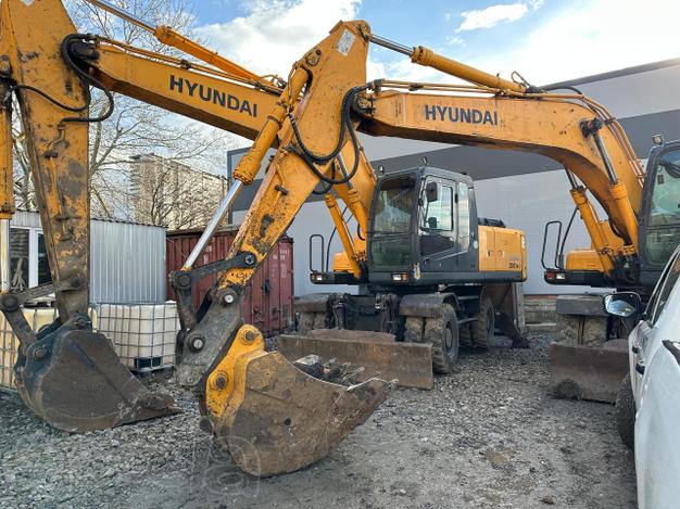 Услуги колёсного экскаватора